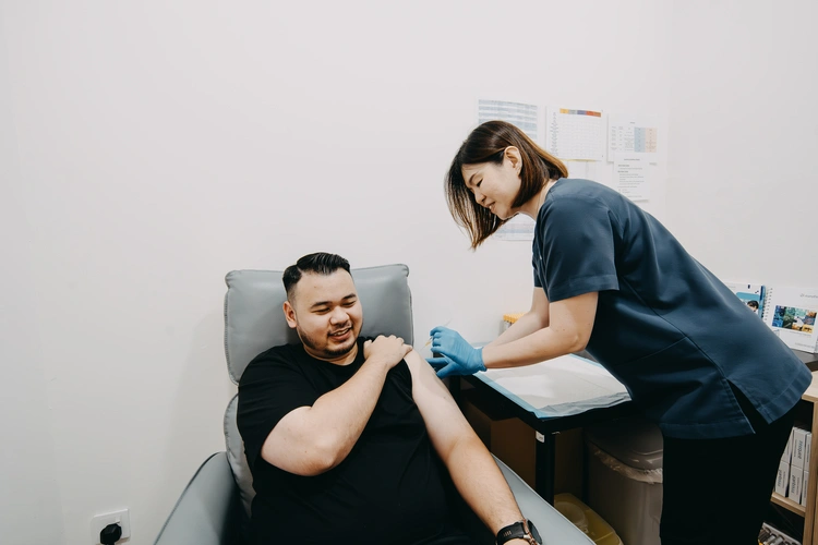 Patient vaccination at Fair Employment Medical Jurong clinic